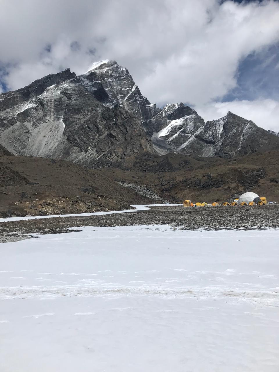 Lobuche high camp below rock and snow peaks